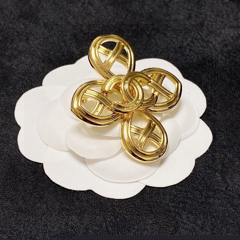 Ch*el brooches